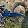 blue swingarm on bike perspective